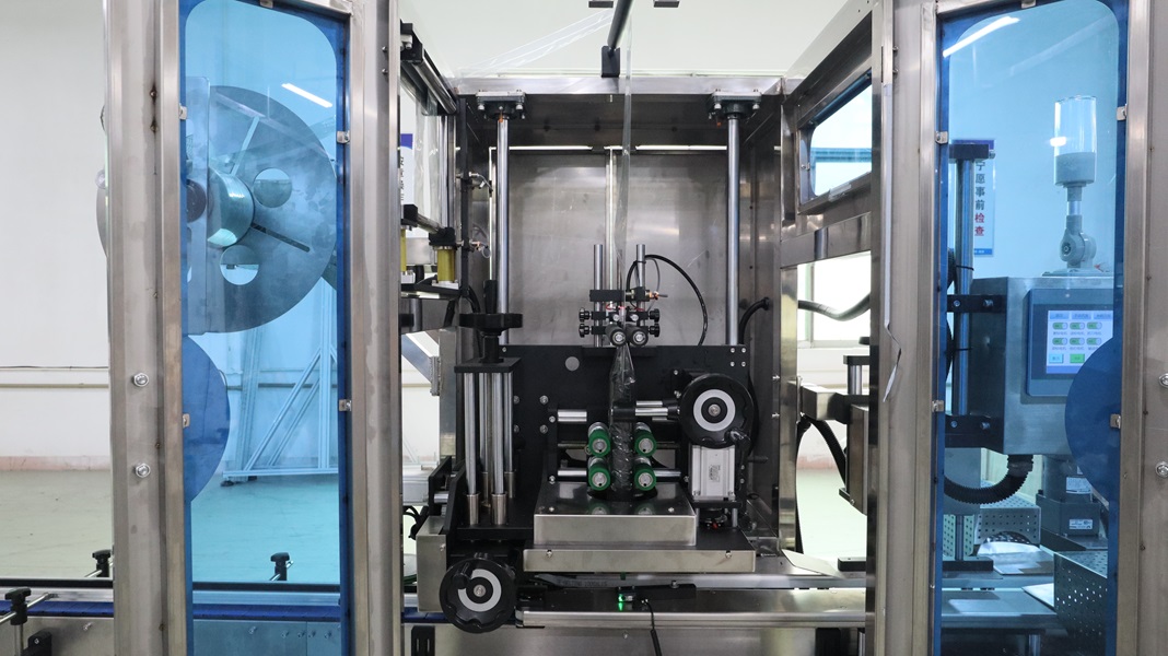 方瓶全自動(dòng)套標(biāo)機(jī),全自動(dòng)套標(biāo)機(jī),套標(biāo)機(jī)